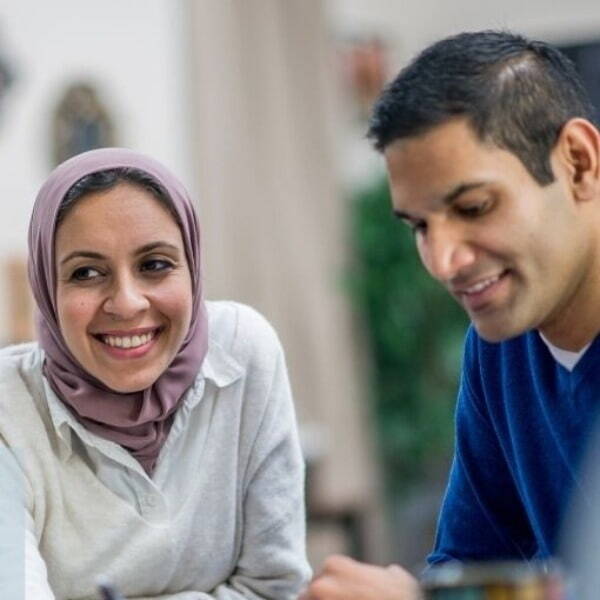 Two people looking at CV