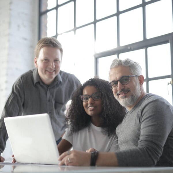 Team Working on Laptop
